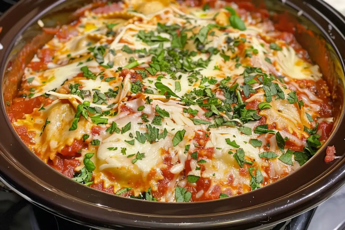 Crockpot Ravioli Lasagna is a quick, cheesy lasagna-style meal using frozen ravioli. Perfect for busy nights—just layer and cook!