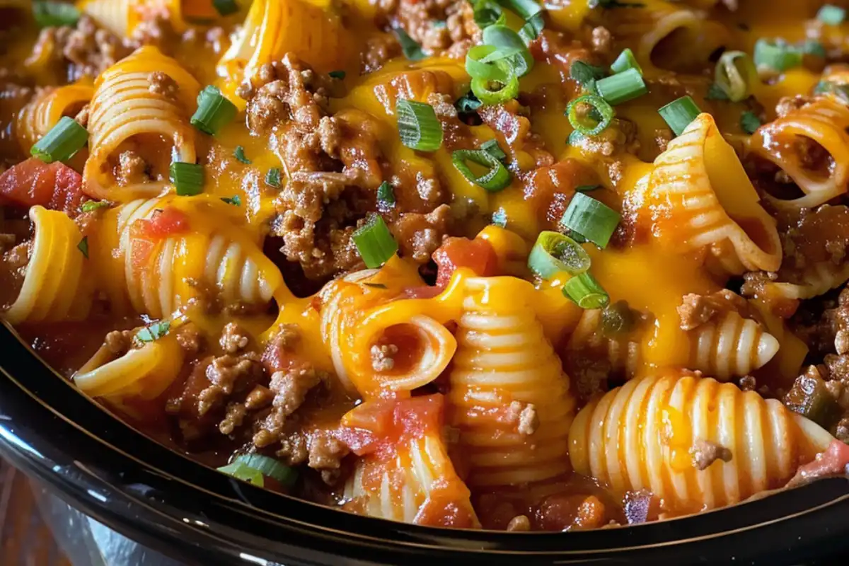 Crock Pot Taco Shells and Cheese is a creamy, cheesy slow cooker pasta with bold taco flavor—perfect for family dinners or parties!