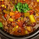 This Crockpot Cowboy Soup is a hearty blend of beef, beans, veggies, and potatoes—easy, comforting, and perfect for chilly nights!