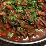 This Mexican Shredded Beef is slow-cooked until tender and juicy—perfect for tacos, burritos, enchiladas, or rice bowls!