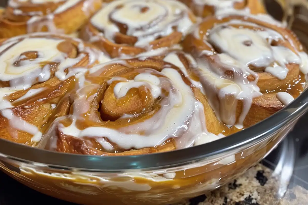 Pumpkin Cheesecake Cinnamon Rolls are fluffy, spiced, and filled with creamy cheesecake—an indulgent fall twist on the classic breakfast roll!