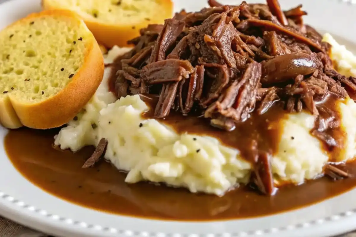 Slow Cooker Beef Manhattan is a hearty, comforting meal with tender roast beef, creamy mashed potatoes, and rich gravy—easy and satisfying!