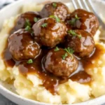 These Slow Cooker Salisbury Steak Meatballs are tender, juicy, and simmered in rich brown gravy—perfect over mashed potatoes or noodles!