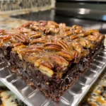 This Brownie Pecan Pie combines fudgy brownies with classic pecan pie topping for a rich, gooey dessert that’s perfect for holidays and special occasions.