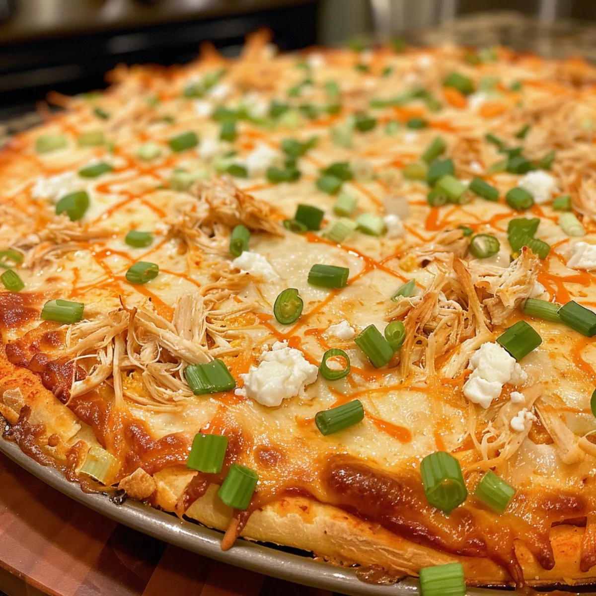 This Buffalo Chicken Pizza Dip is cheesy, spicy, and loaded with buffalo chicken, ranch, and melty cheese. Perfect for game day or parties!