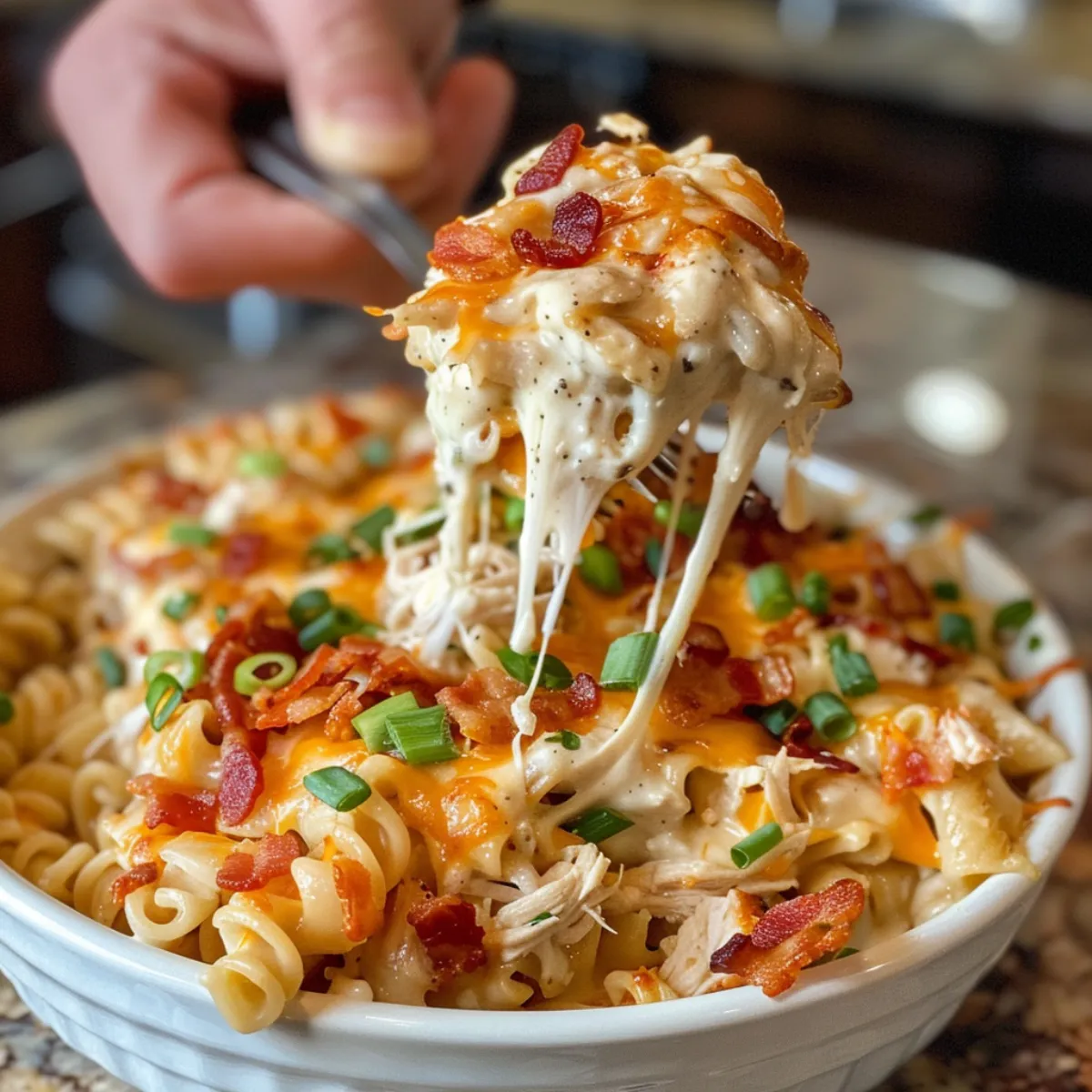 Crazy Good Casserole is a cheesy chicken bacon bake with pasta, cream sauce, and melted cheese—a family favorite comfort food dinner.