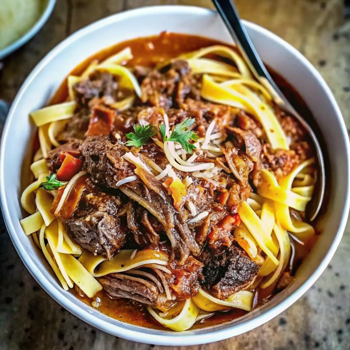 Sunday Slow Cooker Beef Ragu is a rich, slow-simmered Italian-style sauce with tender beef, tomatoes, and herbs—perfect over pasta or polenta.
