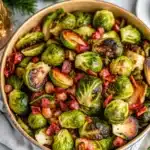 Bacon Brussels Sprouts are roasted to perfection with garlic, olive oil, and crispy bacon. A savory, caramelized holiday side dish that’s perfect for Thanksgiving or Christmas.