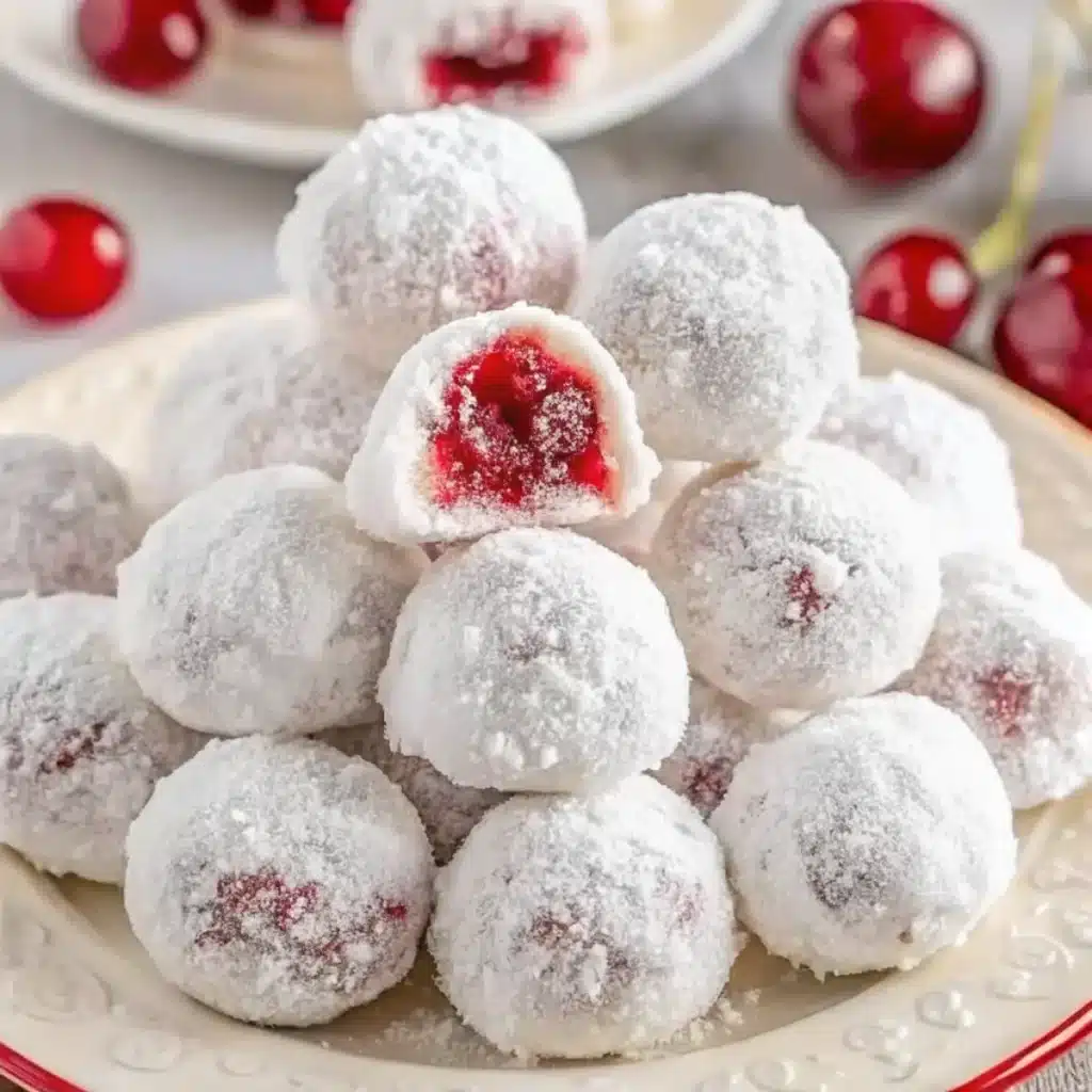 Cherry Snowball Cookies are buttery, melt-in-your-mouth treats with maraschino cherries hidden inside. Coated in powdered sugar, they’re perfect for Christmas gifting.