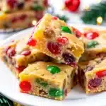 Festive Christmas Fruitcake Bars are soft, chewy, and filled with candied fruit and nuts. An easy, colorful holiday dessert that’s perfect for gifting or parties.
