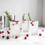 The Mistletoe Kiss is a festive Christmas cocktail with vodka, cranberry juice, and lime. Refreshing, sparkling, and perfect for holiday celebrations