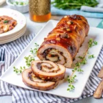 Make Apple & Bacon Stuffed Pork Loin Roll with sweet apples, smoky bacon, and tender roasted pork for a cozy holiday dinner.