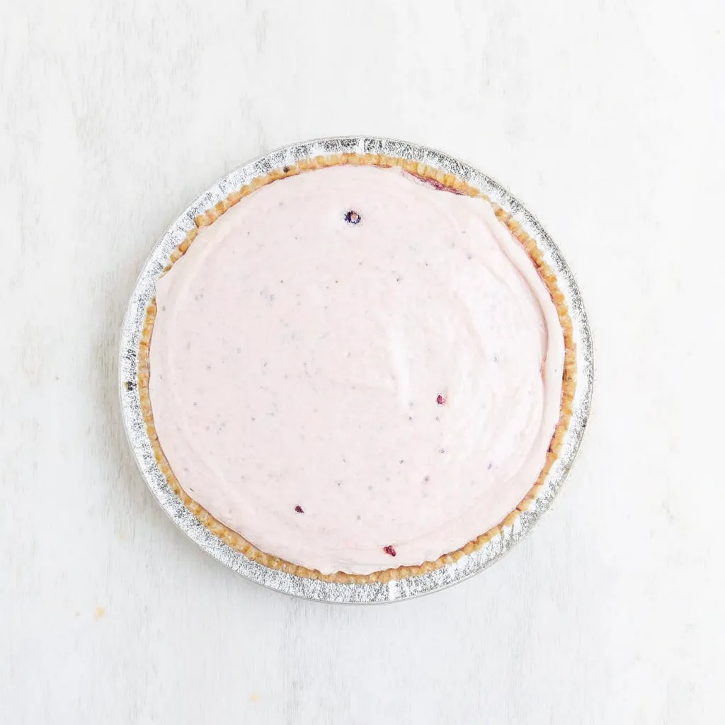 This No Bake Cranberry Pie is creamy, festive, and easy—made with whole berry cranberry sauce and a buttery graham crust. Perfect holiday dessert!