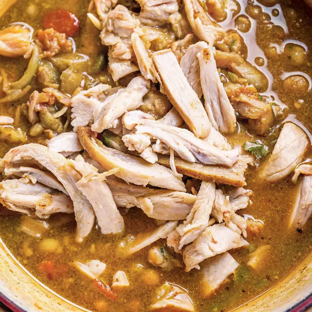 This Cajun White Chicken Chili is creamy, hearty, and full of bold Cajun flavor with tender chicken, white beans, chilies, and melted cheese.