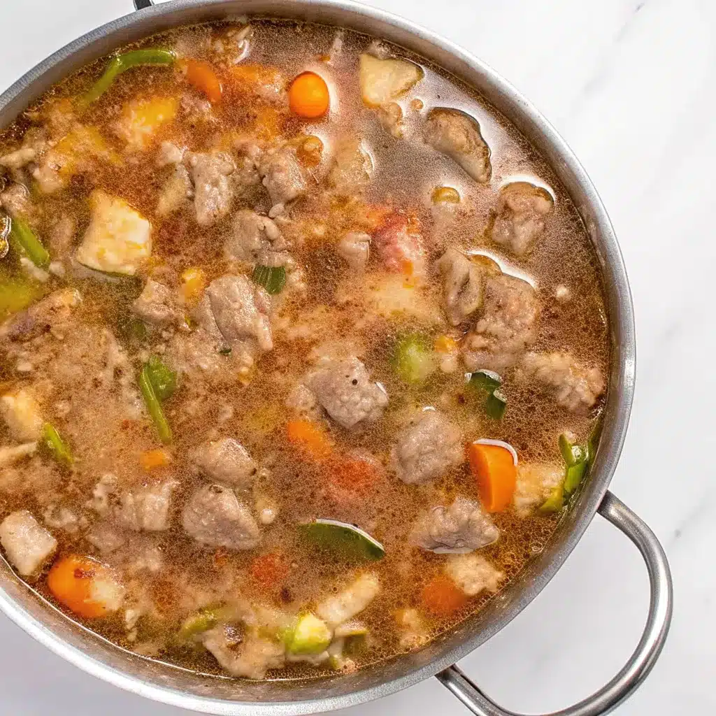 This Green Chili Stew with Pork is hearty, tender, and full of bold Southwestern flavor with roasted green chilies, pork shoulder, potatoes, and spices.
