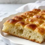 This sourdough discard focaccia bread is soft, fluffy, and full of olive oil flavor. An easy, beginner-friendly bread recipe perfect for any meal.